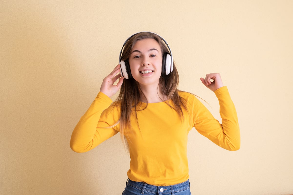 Teen Girl Wearing Headphones 